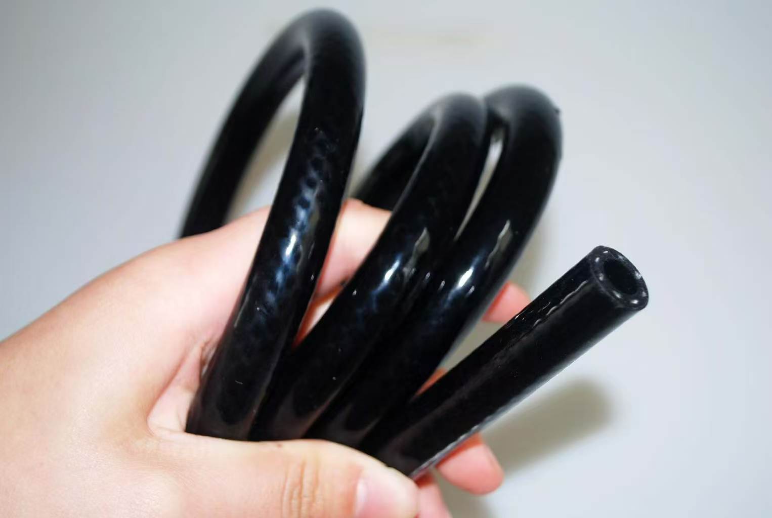 Will a silicone hose hold up to gasoline?