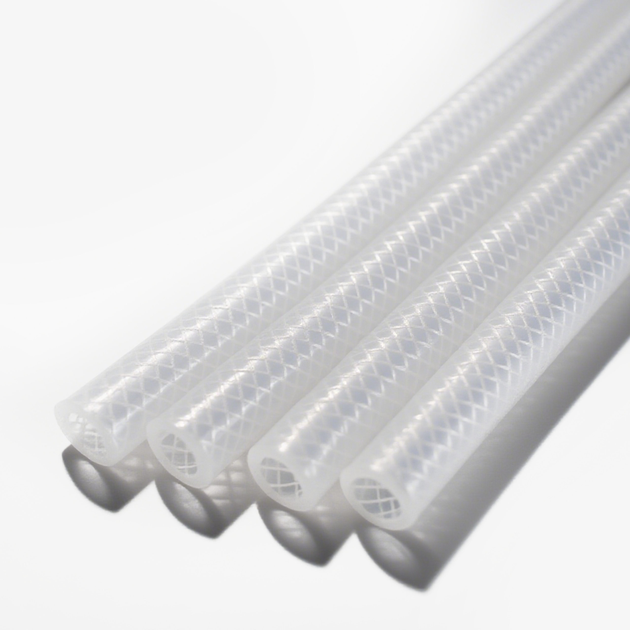 Fiber reinforced braided silicone hose