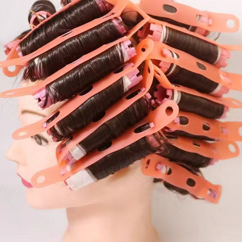 Thermochromic silicone perm rubber band on hair mannequin, salon hair perm tool
