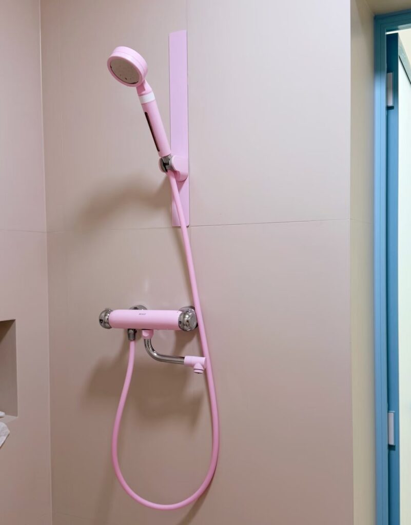 Pure silicone shower hose installed in shower room